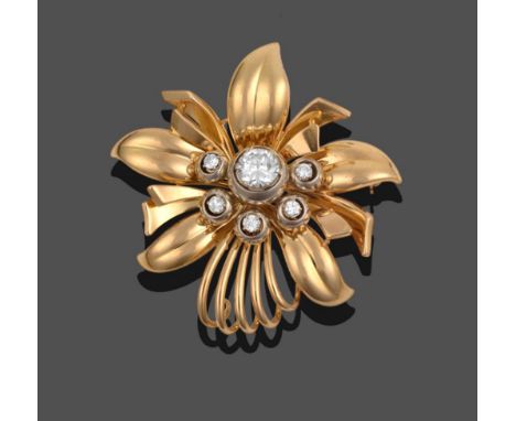 A Diamond Brooch, the stylised flower with round brilliant cut diamonds set centrally, total estimated diamond weight 1.35 ca