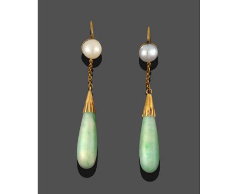 A Pair of Pearl and Jade Drop Earrings, the three-quarter pearls suspend chain links to a cup holding a jade drop, length 5.4
