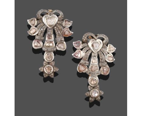 A Pair of Diamond Earrings, in the Moghal Style, diamonds cut in a naive manner, and eight-cut diamonds inset to a drop compr