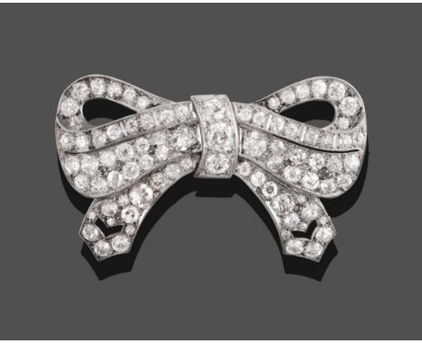 A Diamond Bow Brooch, modelled as a ribbon bow with pointed ends and set throughout with old cut diamonds, in white settings,