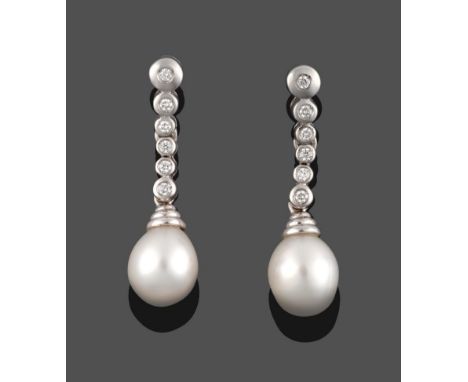 A Pair of Diamond and Cultured Pearl Drop Earrings, a row of round brilliant cut diamonds in white collet settings, with a cu