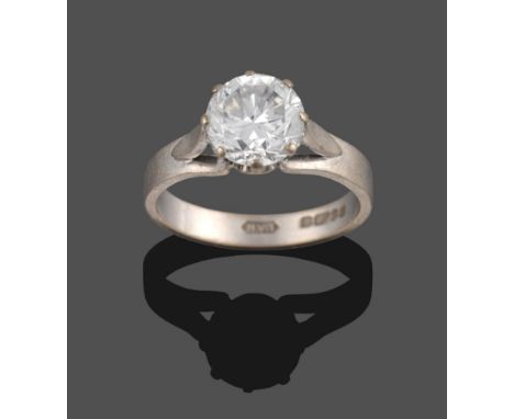 An 18 Carat White Gold Diamond Solitaire Ring, the round brilliant cut diamond in a white eight claw setting, with lozenge ap
