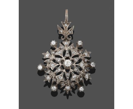 A 19th Century Diamond Starburst Pendant, old cut and rose cut diamonds in white claw settings throughout, on a yellow trace 