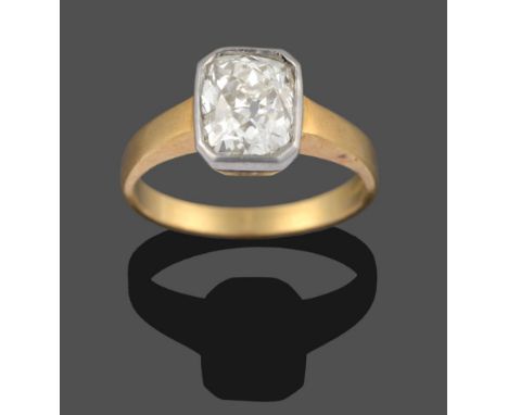 An 18 Carat Gold Diamond Solitaire Ring, the old mine cut diamond in a modern setting, a white collet holding the diamond on 