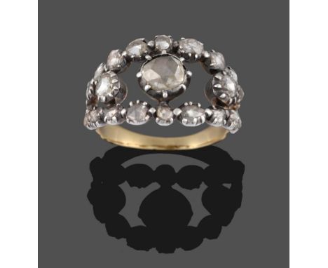 A Georgian Diamond Ring, a two-row curved half hoop of rose cut diamonds with three graduated rose cut diamonds within, in wh