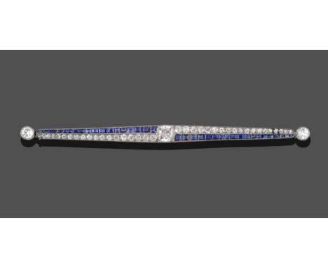 An Art Deco Sapphire and Diamond Bar Brooch, an old cut diamond centrally, within tapered bars set in opposition to each othe