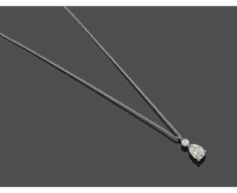 A Diamond Pendant on an 18 Carat White Gold Chain, a round brilliant cut diamond in a white collet setting suspends a pear cu
