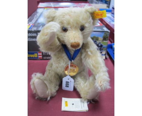 A Steiff Mohair Teddy Bear, exclusive to Danbury Mint 2004 No. 661365, labels attached, approximately 30cm high.