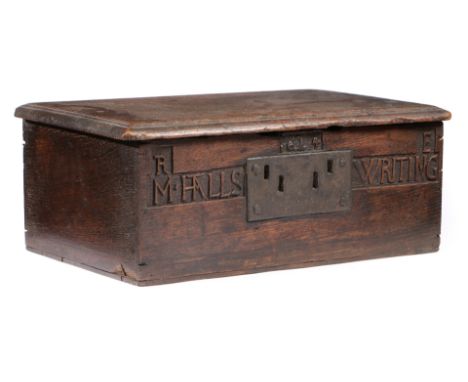 Having a triple-reeded one-piece top, the frieze centred by the date '1624' over a large iron lock plate, flanked by the init
