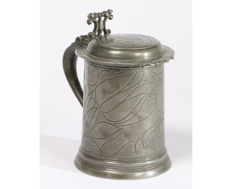 Having a straight-sided drum with a pair of 'love birds' amongst tulip stems, the lid with front denticulations and decorated