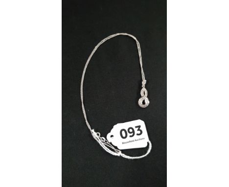 9 CARAT WHITE GOLD AND DIAMOND DROP ON SILVER CHAIN 