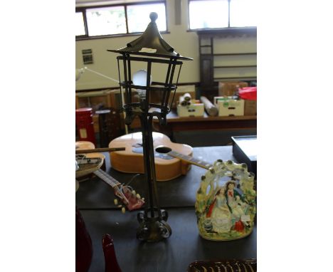 Small metal standard lamp