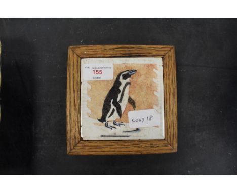 Minton 'Penguin' tile in oak stand