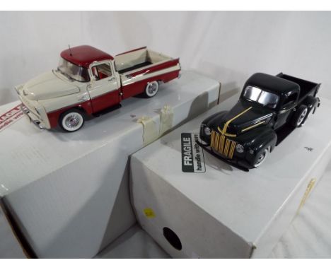 Two Danbury Mint Precision Models comprising 1957 Dodge Sweptside D100 and 1942 Ford Pickup, both 1:24 scale in original poly