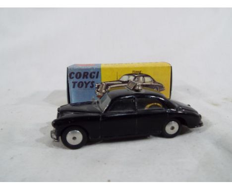 Corgi Toys - a Riley Pathfinder Police Car # 209 in repro Corgi box - Est £25 - £35