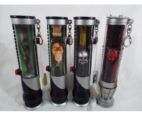 Star Wars - four novelty Star Wars watches contained in their original Light Sabre cases by Lucasfilm Ltd, various characters