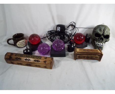 Gothic / Halloween interest - a novelty smoking (dry ice) skull, bubble glass dome paper weights bwith LED light-up stands, j