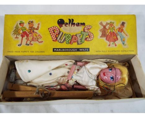 Pelham Puppet - a standard puppet depicting a girl, excellent in original box 