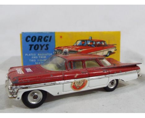 Corgi Toys - a Chevrolet Impala Fire Chief # 482 in repro Corgi box - Est £20 - £30