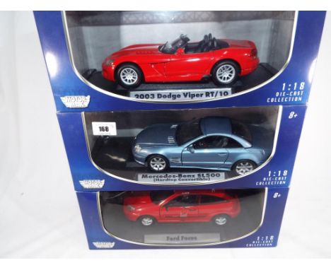 Motor Max Die-Cast Collection - three 1:18 scale diecast model motor cars comprising 2003 Dodge Viper RT/10, Ford Focus and M