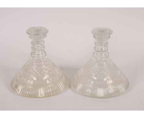 A pair of good quality cut crystal ships decanters with hobnail thumb press and triple ring decoration, having mushroom stopp