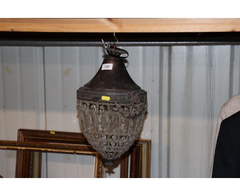 An acorn shaped hanging pendant light with prism decoration 