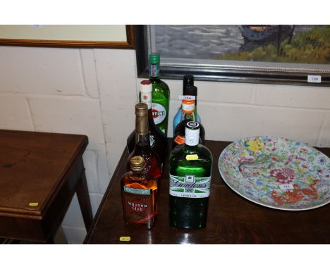 A quantity of various alcohol to include Gordons London Gin, Martell Fine Cognac, Benedictine, Martine, Cockburns port