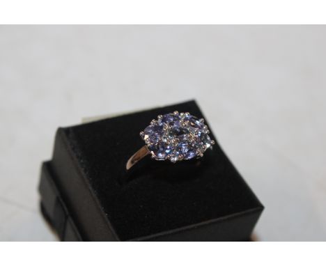 A Sterling silver and tanzanite set dress ring, ring size T/U