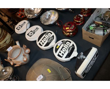A pair of Hella 160 spot lamps; a Hella 181 fog lamp; and a pair of Cibie Iode