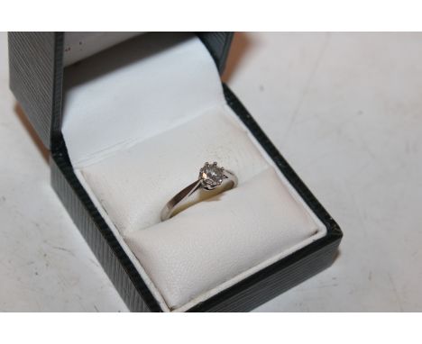 An 18ct white gold and solitaire diamond ring, ring size L. approx. total weight 2.5gms, approx. diamond weight 0.40 carats