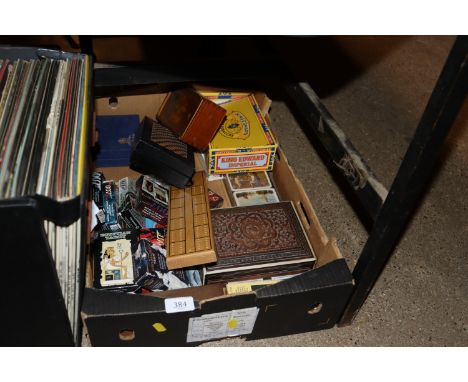 A box of various playing cards etc. 