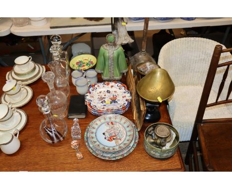 A quantity of decanters and stoppers; Oriental plates; coinage; wash dolly; glass shades; scales and wights, bell weights etc