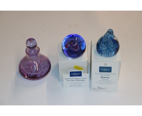 Two Caithness paperweights "Rain Drop" and miniature "Millennium"; and a glass scent bottle 