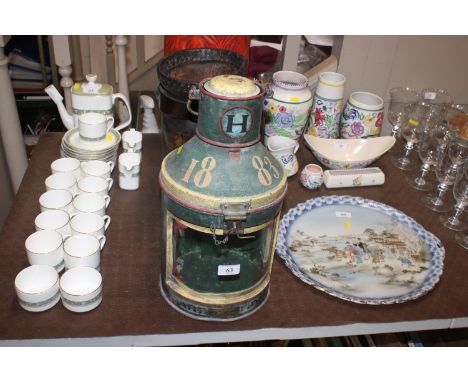 A painted and decorated railway lantern 