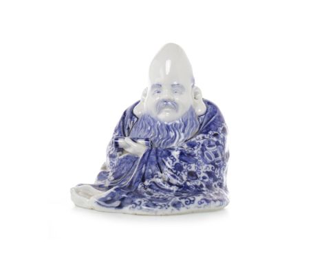 MID 20TH CENTURY CHINESE BLUE AND WHITE FIGURE OF SHAO LAO modelled holding a scroll, 14.5cm high