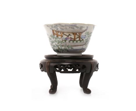 EARLY 20TH CENTURY CHINESE FAMILLE ROSE TEA BOWLpainted with figures in architectural settings, with script and red seal mark