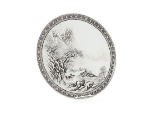 EARLY 20TH CENTURY CHINESE CIRCULAR PLATEdecorated with a winter scene with a horse and figures in a mountainous landscape, r