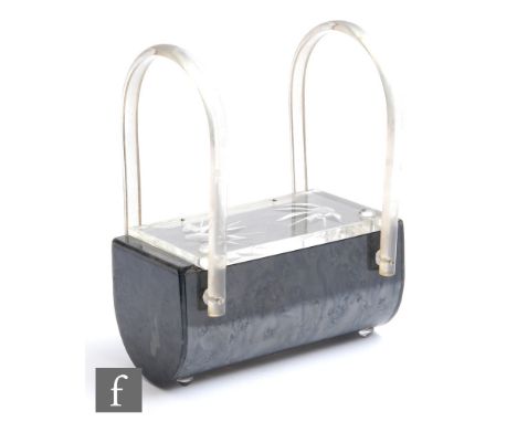 A 20th Century Llewellyn Inc. Lucite handbag, of rectangular section decorated in a grey marble effect, with a Lucite cover c