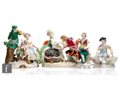 Four assorted early to mid 20th Century Dresden type figures, the first modelled as a lady and gentleman playing chess, the s