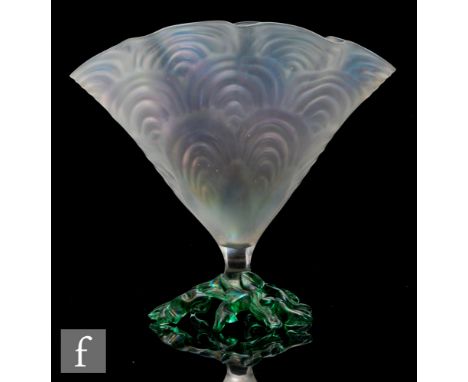 A John Walsh Walsh glass fan vase, the moulded body decorated with repeated arch motif on a opal iridescent ground above a na