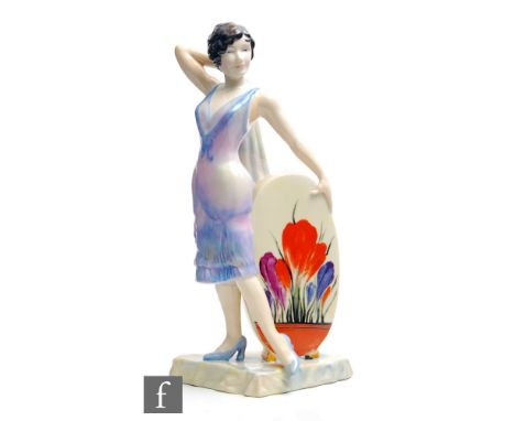 A Carlton Ware Limited Edition hand painted figure, titled Clarice Cliff - The Sunshine Girl, modelled as a stylish lady in a