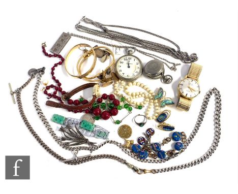 A small parcel lot of silver and costume jewellery to include a gold plated bangle, ingots, silver Albert and other chains, c