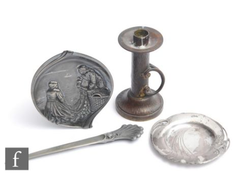 A collection of Art Nouveau pewter items, to include a peacock design letter opener stamped 'Jacob', length 23cm, an ashtray,