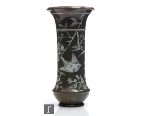 A late 19th Century Doulton Lambeth vase by Florence Barlow decorated with incised and hand painted white enamel birds on flo