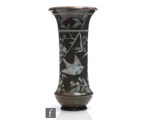 A late 19th Century Doulton Lambeth vase by Florence Barlow decorated with incised and hand painted white enamel birds on flo