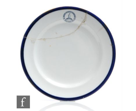 An early 20th Century Dunn Bennett Patent side plate from the wardroom of the Terra Nova, white with a dark blue border and g