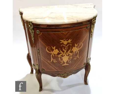 A 20th Century Louis XV style marquetry inlaid commode, gilt metal mounts below a figured white marble top, on slender cabrio