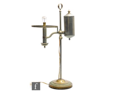 An Edwardian silvered and brass students lamp with milk glass shade, on circular gadrooned base, with name plate Mancer &amp;