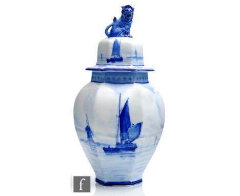 A Royal Crown Derby hexagonal vase and cover decorated in the style of W.E.J Dean with blue sailing boats on calm waters, the