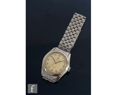 A stainless steel Rolex Oyster precision, manual wrist watch, Arabic numerals to a cream dial, case diameter 34mm, all to Rol